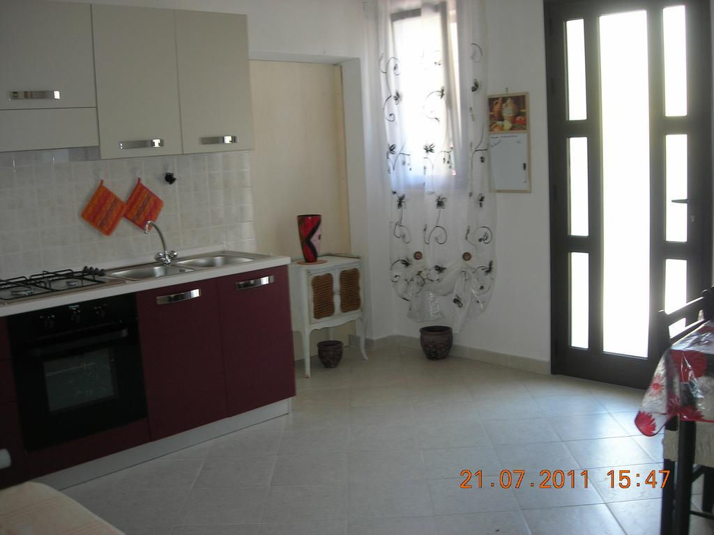 Апартаменты Casa Ольбия Номер фото