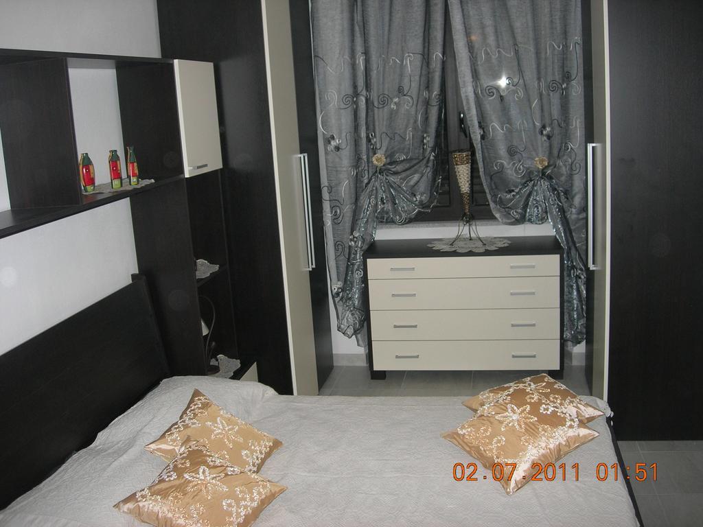 Апартаменты Casa Ольбия Номер фото